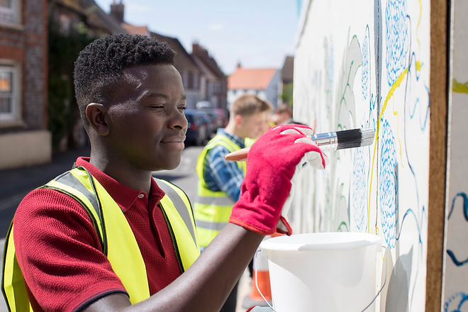 Man Painting a Wall